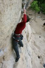 Me top rope climbing Diving for Rocks (5.10d), photographed from  the third bolt of Magster (5.10a) by Andrew Dreher.  It was another long day of rock climbing at Seismic Wall on Austin's Barton Creek Greenbelt, Saturday, April 11, 2009.

Filename: SRM_20090411_17163733.JPG
Aperture: f/5.6
Shutter Speed: 1/320
Body: Canon EOS-1D Mark II
Lens: Canon EF 16-35mm f/2.8 L