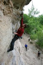 Me top rope climbing Diving for Rocks (5.10d), photographed from  the third bolt of Magster (5.10a) by Andrew Dreher.  It was another long day of rock climbing at Seismic Wall on Austin's Barton Creek Greenbelt, Saturday, April 11, 2009.

Filename: SRM_20090411_17165042.JPG
Aperture: f/5.6
Shutter Speed: 1/320
Body: Canon EOS-1D Mark II
Lens: Canon EF 16-35mm f/2.8 L