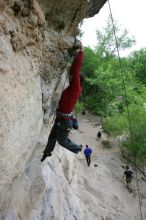 Me top rope climbing Diving for Rocks (5.10d), photographed from  the third bolt of Magster (5.10a) by Andrew Dreher.  It was another long day of rock climbing at Seismic Wall on Austin's Barton Creek Greenbelt, Saturday, April 11, 2009.

Filename: SRM_20090411_17165043.JPG
Aperture: f/5.6
Shutter Speed: 1/320
Body: Canon EOS-1D Mark II
Lens: Canon EF 16-35mm f/2.8 L