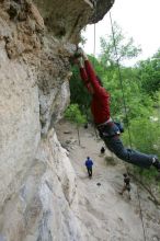 Me top rope climbing Diving for Rocks (5.10d), photographed from  the third bolt of Magster (5.10a) by Andrew Dreher.  It was another long day of rock climbing at Seismic Wall on Austin's Barton Creek Greenbelt, Saturday, April 11, 2009.

Filename: SRM_20090411_17165147.JPG
Aperture: f/5.6
Shutter Speed: 1/320
Body: Canon EOS-1D Mark II
Lens: Canon EF 16-35mm f/2.8 L