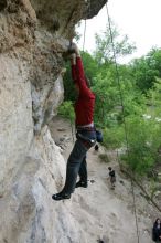 Me top rope climbing Diving for Rocks (5.10d), photographed from  the third bolt of Magster (5.10a) by Andrew Dreher.  It was another long day of rock climbing at Seismic Wall on Austin's Barton Creek Greenbelt, Saturday, April 11, 2009.

Filename: SRM_20090411_17165249.JPG
Aperture: f/5.6
Shutter Speed: 1/320
Body: Canon EOS-1D Mark II
Lens: Canon EF 16-35mm f/2.8 L