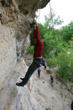 Me top rope climbing Diving for Rocks (5.10d), photographed from  the third bolt of Magster (5.10a) by Andrew Dreher.  It was another long day of rock climbing at Seismic Wall on Austin's Barton Creek Greenbelt, Saturday, April 11, 2009.

Filename: SRM_20090411_17165250.JPG
Aperture: f/5.6
Shutter Speed: 1/320
Body: Canon EOS-1D Mark II
Lens: Canon EF 16-35mm f/2.8 L