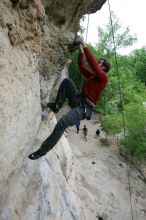 Me top rope climbing Diving for Rocks (5.10d), photographed from  the third bolt of Magster (5.10a) by Andrew Dreher.  It was another long day of rock climbing at Seismic Wall on Austin's Barton Creek Greenbelt, Saturday, April 11, 2009.

Filename: SRM_20090411_17165655.JPG
Aperture: f/5.6
Shutter Speed: 1/320
Body: Canon EOS-1D Mark II
Lens: Canon EF 16-35mm f/2.8 L