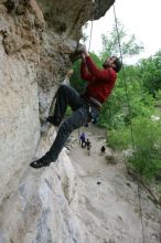 Me top rope climbing Diving for Rocks (5.10d), photographed from  the third bolt of Magster (5.10a) by Andrew Dreher.  It was another long day of rock climbing at Seismic Wall on Austin's Barton Creek Greenbelt, Saturday, April 11, 2009.

Filename: SRM_20090411_17165757.JPG
Aperture: f/5.6
Shutter Speed: 1/320
Body: Canon EOS-1D Mark II
Lens: Canon EF 16-35mm f/2.8 L