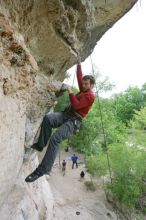 Me top rope climbing Diving for Rocks (5.10d), photographed from  the third bolt of Magster (5.10a) by Andrew Dreher.  It was another long day of rock climbing at Seismic Wall on Austin's Barton Creek Greenbelt, Saturday, April 11, 2009.

Filename: SRM_20090411_17165960.JPG
Aperture: f/5.6
Shutter Speed: 1/320
Body: Canon EOS-1D Mark II
Lens: Canon EF 16-35mm f/2.8 L