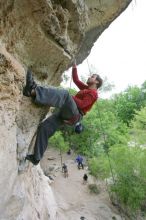 Me top rope climbing Diving for Rocks (5.10d), photographed from  the third bolt of Magster (5.10a) by Andrew Dreher.  It was another long day of rock climbing at Seismic Wall on Austin's Barton Creek Greenbelt, Saturday, April 11, 2009.

Filename: SRM_20090411_17170062.JPG
Aperture: f/5.6
Shutter Speed: 1/320
Body: Canon EOS-1D Mark II
Lens: Canon EF 16-35mm f/2.8 L