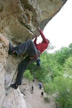 Me top rope climbing Diving for Rocks (5.10d), photographed from  the third bolt of Magster (5.10a) by Andrew Dreher.  It was another long day of rock climbing at Seismic Wall on Austin's Barton Creek Greenbelt, Saturday, April 11, 2009.

Filename: SRM_20090411_17170367.JPG
Aperture: f/5.6
Shutter Speed: 1/320
Body: Canon EOS-1D Mark II
Lens: Canon EF 16-35mm f/2.8 L