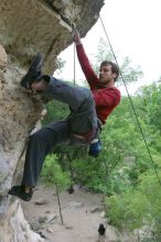 Me top rope climbing Diving for Rocks (5.10d), photographed from  the third bolt of Magster (5.10a) by Andrew Dreher.  It was another long day of rock climbing at Seismic Wall on Austin's Barton Creek Greenbelt, Saturday, April 11, 2009.

Filename: SRM_20090411_17180175.JPG
Aperture: f/5.6
Shutter Speed: 1/320
Body: Canon EOS-1D Mark II
Lens: Canon EF 16-35mm f/2.8 L