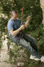 Sean O'Grady climbs in just running shoes.  CTM hosted a speed climbing event at Seismic Wall on Diving for Rocks to benefit the Austin Area Food Bank, Saturday, May 9, 2009.

Filename: SRM_20090509_11321335.jpg
Aperture: f/5.6
Shutter Speed: 1/320
Body: Canon EOS-1D Mark II
Lens: Canon EF 80-200mm f/2.8 L