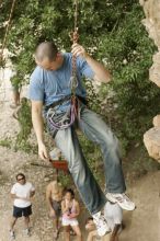 Sean O'Grady climbs in just running shoes.  CTM hosted a speed climbing event at Seismic Wall on Diving for Rocks to benefit the Austin Area Food Bank, Saturday, May 9, 2009.

Filename: SRM_20090509_11321337.jpg
Aperture: f/5.6
Shutter Speed: 1/250
Body: Canon EOS-1D Mark II
Lens: Canon EF 80-200mm f/2.8 L