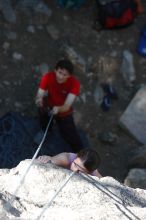 Beth Marek top rope climbing Roo Dog (5.8) with Andrew Dreher belaying, taken from the anchors of the route.  It was Beth's third time outside, and another long day of rock climbing at Seismic Wall on Austin's Barton Creek Greenbelt, Monday, May 25, 2009.

Filename: SRM_20090525_09414591.JPG
Aperture: f/4.0
Shutter Speed: 1/500
Body: Canon EOS-1D Mark II
Lens: Canon EF 80-200mm f/2.8 L