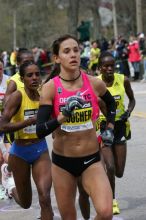 Kara Goucher was the third female to cross the finish line with a time of 2:32:25.  The 113th Boston Marathon took place on Monday, April 20, 2009.

Filename: SRM_20090420_10333904.JPG
Aperture: f/8.0
Shutter Speed: 1/800
Body: Canon EOS-1D Mark II
Lens: Canon EF 100-400mm f/4.5-5.6 L IS USM