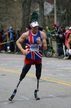 Richard Whitehead, bib #8858, finished with a time of 3:02:44.  The 113th Boston Marathon took place on Monday, April 20, 2009.

Filename: SRM_20090420_10411852.JPG
Aperture: f/8.0
Shutter Speed: 1/1000
Body: Canon EOS-1D Mark II
Lens: Canon EF 100-400mm f/4.5-5.6 L IS USM