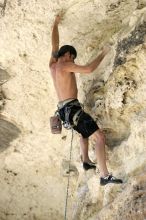 Tyler climbing Lonsome Dove (5.12), the roof above Diving for Rocks.  It was another long day of rock climbing at Seismic Wall on Austin's Barton Creek Greenbelt, Sunday, June 7, 2009.

Filename: SRM_20090607_13383974.jpg
Aperture: f/4.0
Shutter Speed: 1/400
Body: Canon EOS-1D Mark II
Lens: Canon EF 80-200mm f/2.8 L