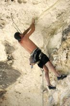 Tyler climbing Lonsome Dove (5.12), the roof above Diving for Rocks.  It was another long day of rock climbing at Seismic Wall on Austin's Barton Creek Greenbelt, Sunday, June 7, 2009.

Filename: SRM_20090607_13385578.jpg
Aperture: f/4.0
Shutter Speed: 1/500
Body: Canon EOS-1D Mark II
Lens: Canon EF 80-200mm f/2.8 L