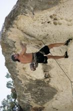 Tyler climbing Lonsome Dove (5.12), the roof above Diving for Rocks.  It was another long day of rock climbing at Seismic Wall on Austin's Barton Creek Greenbelt, Sunday, June 7, 2009.

Filename: SRM_20090607_13443192.jpg
Aperture: f/4.0
Shutter Speed: 1/500
Body: Canon EOS-1D Mark II
Lens: Canon EF 80-200mm f/2.8 L