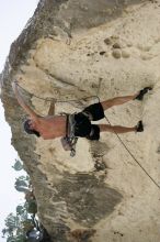 Tyler climbing Lonsome Dove (5.12), the roof above Diving for Rocks.  It was another long day of rock climbing at Seismic Wall on Austin's Barton Creek Greenbelt, Sunday, June 7, 2009.

Filename: SRM_20090607_13443602.jpg
Aperture: f/4.0
Shutter Speed: 1/500
Body: Canon EOS-1D Mark II
Lens: Canon EF 80-200mm f/2.8 L