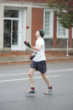 Barry Goldmeier, bib #16608 (8K) and  #5587 (marathon) juggling and running the 8K at the Richmond SunTrust Marathon and McDonald's Half Marathon, on Saturday, November 14, 2009.

Filename: SRM_20091114_07573260.JPG
Aperture: f/2.8
Shutter Speed: 1/320
Body: Canon EOS-1D Mark II
Lens: Canon EF 80-200mm f/2.8 L