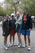 Beth Marek, Katie Lannon, Kelly Saalwachter, and John Saalwachter after running the Richmond SunTrust Marathon and McDonald's Half Marathon, on Saturday, November 14, 2009.

Filename: SRM_20091114_12340081.JPG
Aperture: f/8.0
Shutter Speed: 1/80
Body: Canon EOS-1D Mark II
Lens: Canon EF 16-35mm f/2.8 L