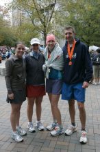 Beth Marek, Katie Lannon, Kelly Saalwachter, and John Saalwachter after running the Richmond SunTrust Marathon and McDonald's Half Marathon, on Saturday, November 14, 2009.

Filename: SRM_20091114_12340082.JPG
Aperture: f/8.0
Shutter Speed: 1/80
Body: Canon EOS-1D Mark II
Lens: Canon EF 16-35mm f/2.8 L