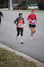 Beth Marek running the Rocket City Marathon on Saturday, December 12, 2009 in Huntsville.

Filename: SRM_20091212_12022223.JPG
Aperture: f/2.8
Shutter Speed: 1/800
Body: Canon EOS-1D Mark II
Lens: Canon EF 80-200mm f/2.8 L