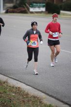 Beth Marek running the Rocket City Marathon on Saturday, December 12, 2009 in Huntsville.

Filename: SRM_20091212_12022224.JPG
Aperture: f/2.8
Shutter Speed: 1/800
Body: Canon EOS-1D Mark II
Lens: Canon EF 80-200mm f/2.8 L