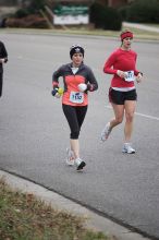 Beth Marek running the Rocket City Marathon on Saturday, December 12, 2009 in Huntsville.

Filename: SRM_20091212_12022326.JPG
Aperture: f/2.8
Shutter Speed: 1/800
Body: Canon EOS-1D Mark II
Lens: Canon EF 80-200mm f/2.8 L