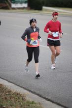 Beth Marek running the Rocket City Marathon on Saturday, December 12, 2009 in Huntsville.

Filename: SRM_20091212_12022327.JPG
Aperture: f/2.8
Shutter Speed: 1/800
Body: Canon EOS-1D Mark II
Lens: Canon EF 80-200mm f/2.8 L