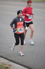 Beth Marek running the Rocket City Marathon on Saturday, December 12, 2009 in Huntsville.

Filename: SRM_20091212_12022536.JPG
Aperture: f/2.8
Shutter Speed: 1/800
Body: Canon EOS-1D Mark II
Lens: Canon EF 80-200mm f/2.8 L