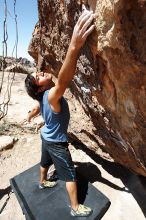 Javier Morales rock climbing in Hueco Tanks State Park and Historic Site during the Hueco Tanks Awesome Fest 2010 trip, Saturday, May 22, 2010.

Filename: SRM_20100522_12203000.JPG
Aperture: f/5.6
Shutter Speed: 1/1600
Body: Canon EOS-1D Mark II
Lens: Canon EF 16-35mm f/2.8 L