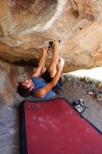 Javier Morales rock climbing on No One Gets Out of Here Alive (V2) in Hueco Tanks State Park and Historic Site during the Hueco Tanks Awesome Fest 2010 trip, Saturday, May 22, 2010.

Filename: SRM_20100522_15225330.JPG
Aperture: f/5.6
Shutter Speed: 1/125
Body: Canon EOS-1D Mark II
Lens: Canon EF 16-35mm f/2.8 L