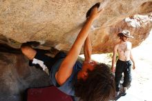 Javier Morales rock climbing on No One Gets Out of Here Alive (V2) in Hueco Tanks State Park and Historic Site during the Hueco Tanks Awesome Fest 2010 trip, Saturday, May 22, 2010.

Filename: SRM_20100522_15230533.JPG
Aperture: f/5.6
Shutter Speed: 1/250
Body: Canon EOS-1D Mark II
Lens: Canon EF 16-35mm f/2.8 L