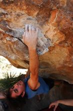 Javier Morales rock climbing on No One Gets Out of Here Alive (V2) in Hueco Tanks State Park and Historic Site during the Hueco Tanks Awesome Fest 2010 trip, Saturday, May 22, 2010.

Filename: SRM_20100522_15231646.JPG
Aperture: f/5.6
Shutter Speed: 1/500
Body: Canon EOS-1D Mark II
Lens: Canon EF 16-35mm f/2.8 L