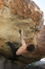 Andrew Dreher rock climbing on No One Gets Out of Here Alive (V2) in Hueco Tanks State Park and Historic Site during the Hueco Tanks Awesome Fest 2010 trip, Sunday, May 23, 2010.

Filename: SRM_20100523_10515736.JPG
Aperture: f/5.6
Shutter Speed: 1/640
Body: Canon EOS-1D Mark II
Lens: Canon EF 16-35mm f/2.8 L