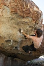 Andrew Dreher rock climbing on No One Gets Out of Here Alive (V2) in Hueco Tanks State Park and Historic Site during the Hueco Tanks Awesome Fest 2010 trip, Sunday, May 23, 2010.

Filename: SRM_20100523_10520353.JPG
Aperture: f/5.6
Shutter Speed: 1/640
Body: Canon EOS-1D Mark II
Lens: Canon EF 16-35mm f/2.8 L