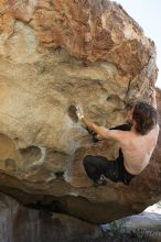 Andrew Dreher rock climbing on No One Gets Out of Here Alive (V2) in Hueco Tanks State Park and Historic Site during the Hueco Tanks Awesome Fest 2010 trip, Sunday, May 23, 2010.

Filename: SRM_20100523_10520354.JPG
Aperture: f/5.6
Shutter Speed: 1/640
Body: Canon EOS-1D Mark II
Lens: Canon EF 16-35mm f/2.8 L