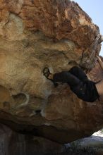 Andrew Dreher rock climbing on No One Gets Out of Here Alive (V2) in Hueco Tanks State Park and Historic Site during the Hueco Tanks Awesome Fest 2010 trip, Sunday, May 23, 2010.

Filename: SRM_20100523_10520957.JPG
Aperture: f/5.6
Shutter Speed: 1/640
Body: Canon EOS-1D Mark II
Lens: Canon EF 16-35mm f/2.8 L