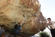 Raanan Robertson rock climbing on No One Gets Out of Here Alive (V2) in Hueco Tanks State Park and Historic Site during the Hueco Tanks Awesome Fest 2010 trip, Sunday, May 23, 2010.

Filename: SRM_20100523_10564883.JPG
Aperture: f/5.6
Shutter Speed: 1/640
Body: Canon EOS-1D Mark II
Lens: Canon EF 16-35mm f/2.8 L