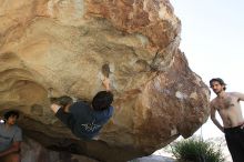 Raanan Robertson rock climbing on No One Gets Out of Here Alive (V2) in Hueco Tanks State Park and Historic Site during the Hueco Tanks Awesome Fest 2010 trip, Sunday, May 23, 2010.

Filename: SRM_20100523_10565085.JPG
Aperture: f/5.6
Shutter Speed: 1/800
Body: Canon EOS-1D Mark II
Lens: Canon EF 16-35mm f/2.8 L