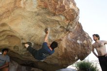 Raanan Robertson rock climbing on No One Gets Out of Here Alive (V2) in Hueco Tanks State Park and Historic Site during the Hueco Tanks Awesome Fest 2010 trip, Sunday, May 23, 2010.

Filename: SRM_20100523_10565187.JPG
Aperture: f/5.6
Shutter Speed: 1/640
Body: Canon EOS-1D Mark II
Lens: Canon EF 16-35mm f/2.8 L