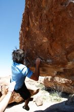 Javier Morales rock climbing on Mexican Chicken (V6) in Hueco Tanks State Park and Historic Site during the Hueco Tanks Awesome Fest 2010 trip, Monday, May 24, 2010.

Filename: SRM_20100524_11554300.JPG
Aperture: f/4.0
Shutter Speed: 1/2000
Body: Canon EOS-1D Mark II
Lens: Canon EF 16-35mm f/2.8 L