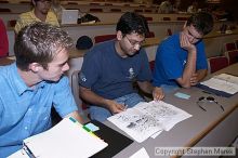 Aaron Bolduc, Aakash Juviwala and Daniel Brooks look over the plans for the new 5th Street Bridge.

Filename: crw_0809_std.jpg
Aperture: f/5.0
Shutter Speed: 1/60
Body: Canon EOS DIGITAL REBEL
Lens: Canon EF-S 18-55mm f/3.5-5.6