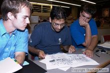 Aaron Bolduc, Aakash Juviwala and Daniel Brooks look over the plans for the new 5th Street Bridge.

Filename: crw_0810_std.jpg
Aperture: f/5.0
Shutter Speed: 1/60
Body: Canon EOS DIGITAL REBEL
Lens: Canon EF-S 18-55mm f/3.5-5.6