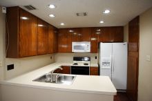 View of the kitchen. Microwave, refrigerator and dishwasher have been recently upgraded.

Filename: SRM_20101228_17422238.JPG
Aperture: f/2.8
Shutter Speed: 1/80
Body: Canon EOS-1D Mark II
Lens: Canon EF 16-35mm f/2.8 L