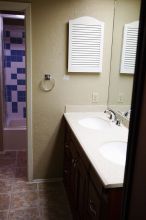 View of the master bath from the closet.

Filename: SRM_20101228_17512054.JPG
Aperture: f/2.8
Shutter Speed: 1/160
Body: Canon EOS-1D Mark II
Lens: Canon EF 16-35mm f/2.8 L