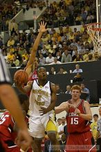 Isma'il Muhammad takes a shot against UGA.  Men's Basketball Georgia Tech beat UGA 87-49.

Filename: crw_5939_std.jpg
Aperture: f/2.8
Shutter Speed: 1/640
Body: Canon EOS DIGITAL REBEL
Lens: Canon EF 80-200mm f/2.8 L