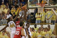 Theodis Tarver fouls a UGA player.  Men's Basketball Georgia Tech beat UGA 87-49.

Filename: crw_6034_std.jpg
Aperture: f/2.8
Shutter Speed: 1/640
Body: Canon EOS DIGITAL REBEL
Lens: Canon EF 80-200mm f/2.8 L