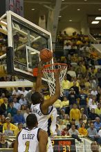 Isma'il Muhammad takes a shot.  Men's Basketball Georgia Tech beat UGA 87-49.

Filename: crw_6027_std.jpg
Aperture: f/2.8
Shutter Speed: 1/640
Body: Canon EOS DIGITAL REBEL
Lens: Canon EF 80-200mm f/2.8 L