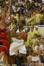 Zam Fredrick II fends off two UGA defenders.  Men's Basketball Georgia Tech beat UGA 87-49.

Filename: crw_5964_std.jpg
Aperture: f/2.8
Shutter Speed: 1/640
Body: Canon EOS DIGITAL REBEL
Lens: Canon EF 80-200mm f/2.8 L