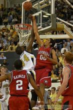 Theodis Tarver shoots against UGA.  Men's Basketball Georgia Tech beat UGA 87-49.

Filename: crw_5965_std.jpg
Aperture: f/2.8
Shutter Speed: 1/640
Body: Canon EOS DIGITAL REBEL
Lens: Canon EF 80-200mm f/2.8 L